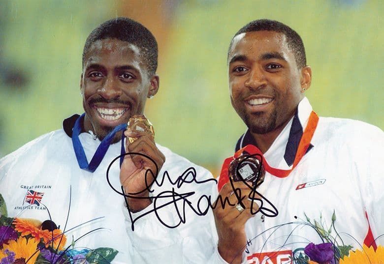Dwain Chambers, 100m sprinter, signed 12x8 inch photo.