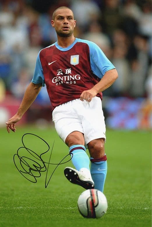 Luke Young, Aston Villa & England, signed 12x8 inch photo.