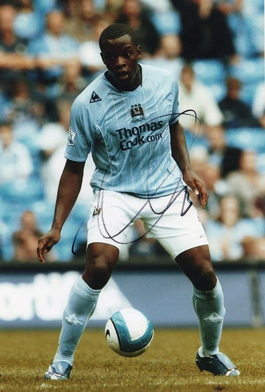 Nedum Onuoha, Manchester City, signed 12x8 inch photo.