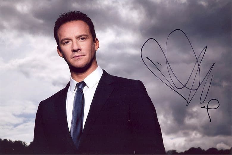 Russell Watson, English classical singer, signed 12x8 inch photo.