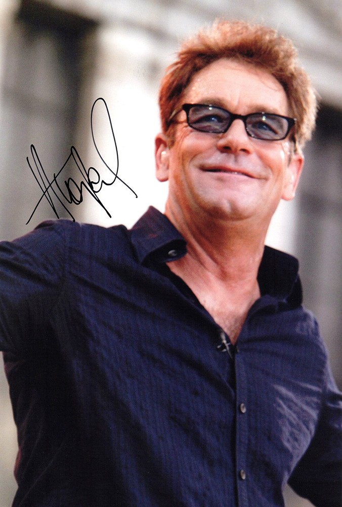 Huey Lewis, signed 12x8 inch photo.