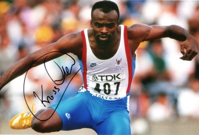 Kriss Akabusi, 400m hurdles, signed 12x8 inch photo.