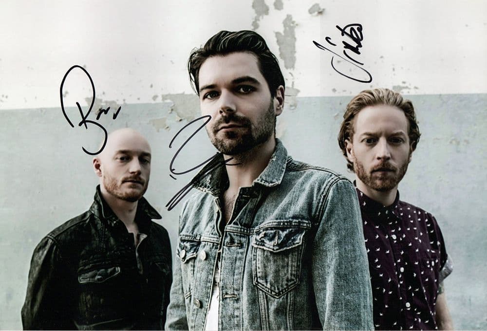 Biffy Clyro, Scottish rock band, signed 12x8 inch photo.