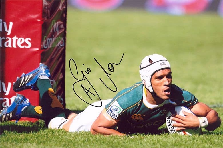 Gio Aplon, South Africa, signed 12x8 inch photo.(2)