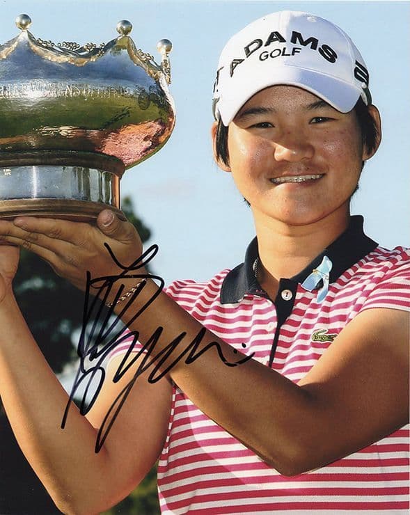 Yani Tseng, signed 10x8 inch photo.(2)